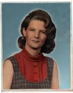 After: the same portrait restored, with the damage repaired and the colors brought back