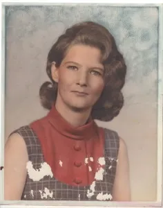Before: a hand-tinted portrait with cracks, stains and missing patches